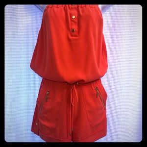 Cache orange romper